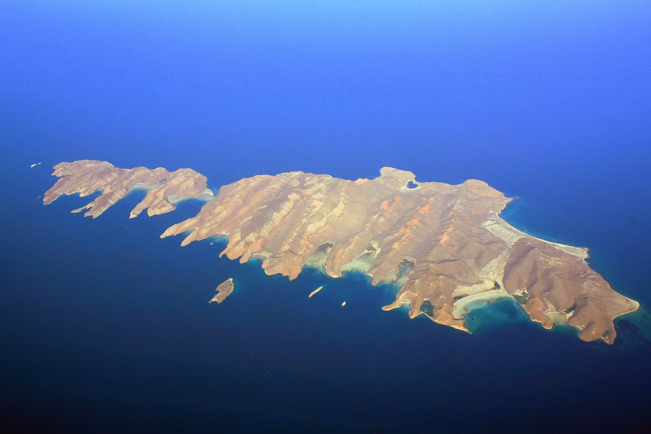 Isla Espíritu Santo is an island in the Gulf of California, off the Mexican state of Baja California Sur. It is connected to Isla Partida by a narrow isthmus. The area is protected under UNESCO as a biosphere, and its importance as an eco-tourism destination is the main factor. The islands are both uninhabited. They are a short boat trip from La Paz on the Baja California peninsula. Ensenada Grande beach, on Isla Partida, was voted the most beautiful beach in Mexico by The Travel Magazine and one of the top 12 beaches in the world.